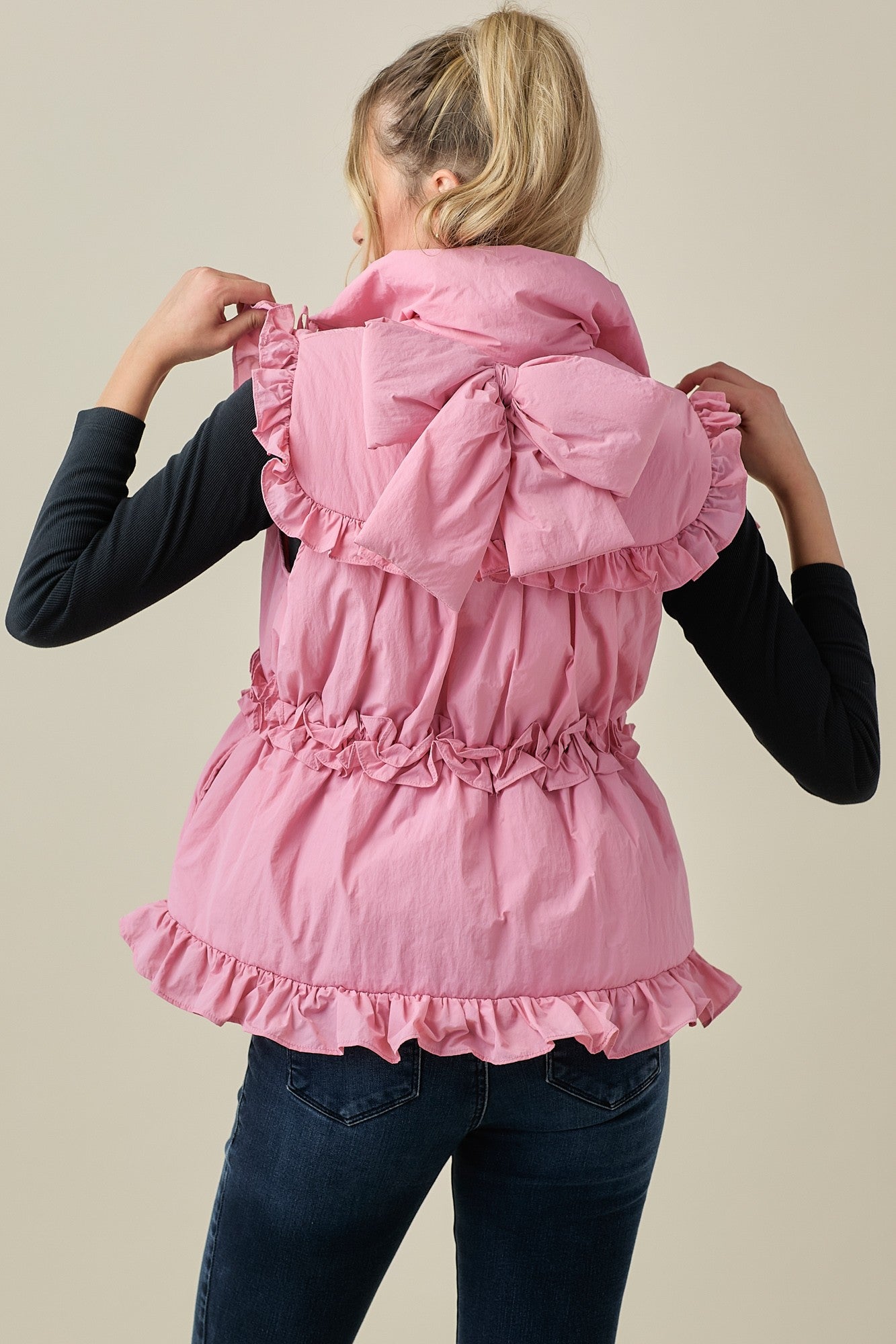 Pink Puffer Vest With Bow Detail