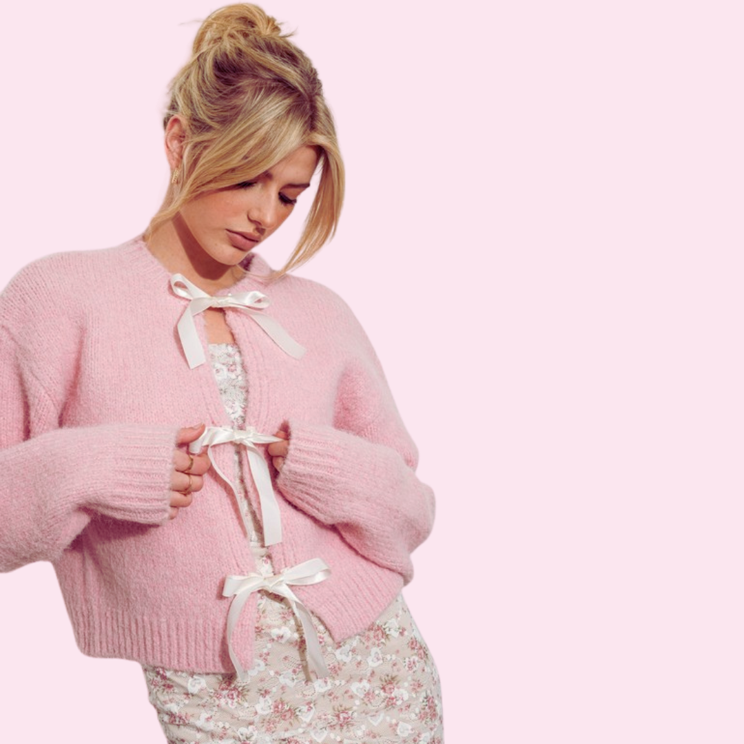 Adult satin bow cardigan featuring delicate bow accents, perfect for layering and adding a feminine touch to casual or dressy outfits.