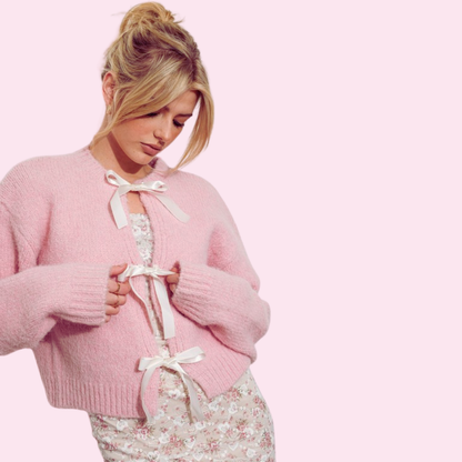 Adult satin bow cardigan featuring delicate bow accents, perfect for layering and adding a feminine touch to casual or dressy outfits.